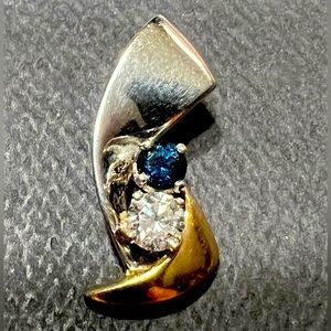 Ladies 14K yellow and white gold pendant with diamond and sapphire